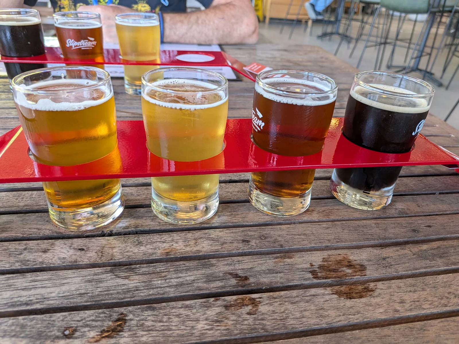 Tasting paddles with a selection of pale, amber and dark beers